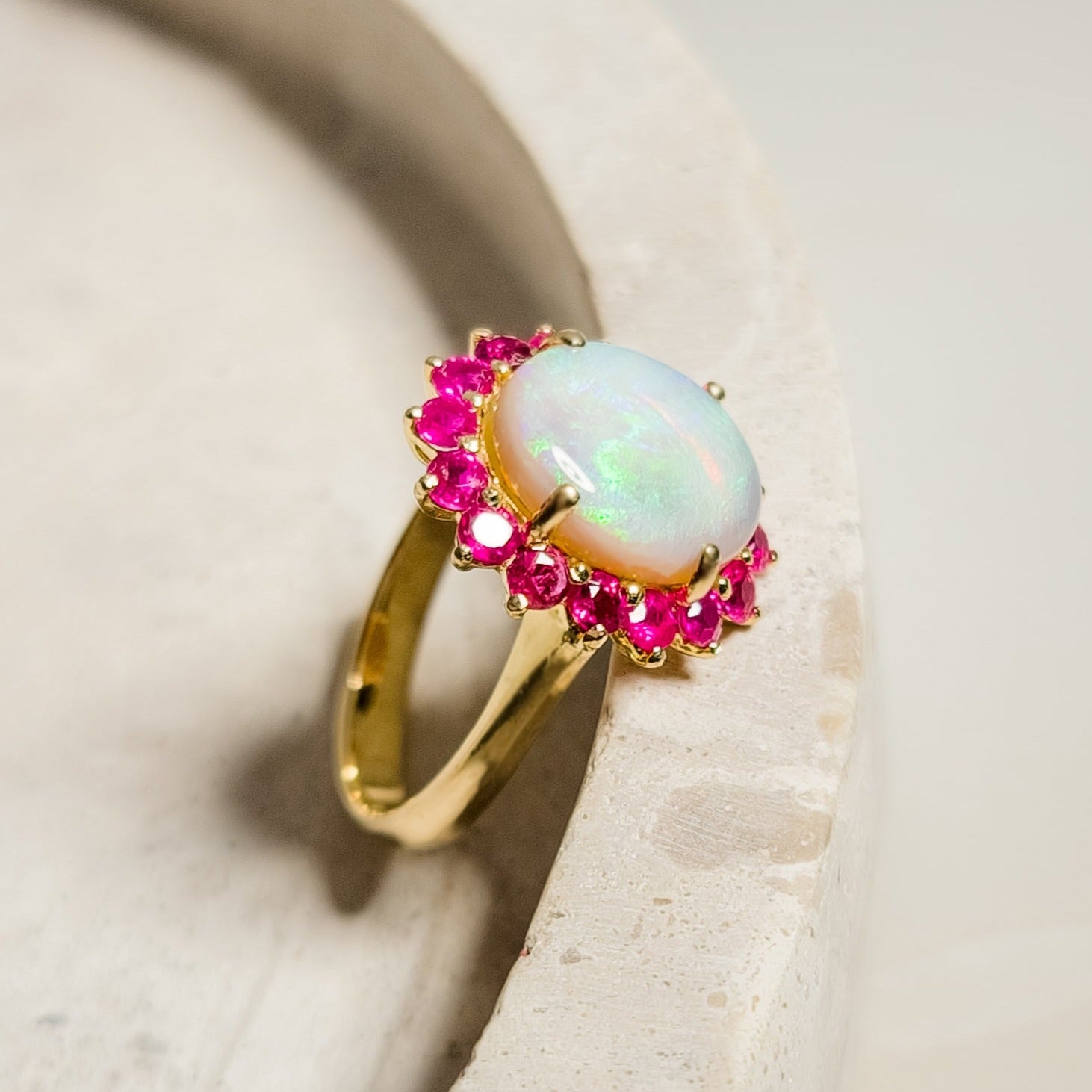 Unique gold ring with solitary opal