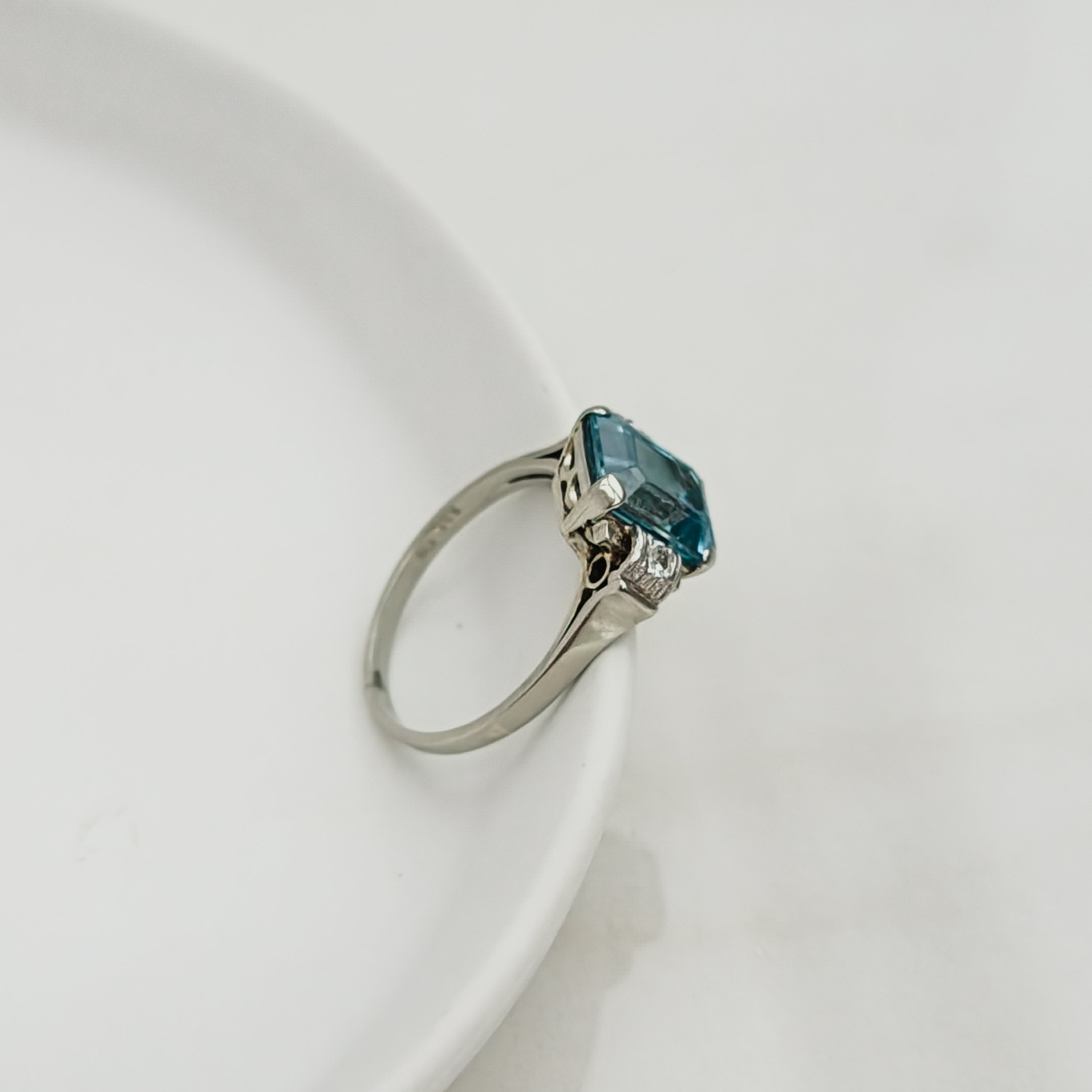 Vintage white gold ring with topaz and diamonds