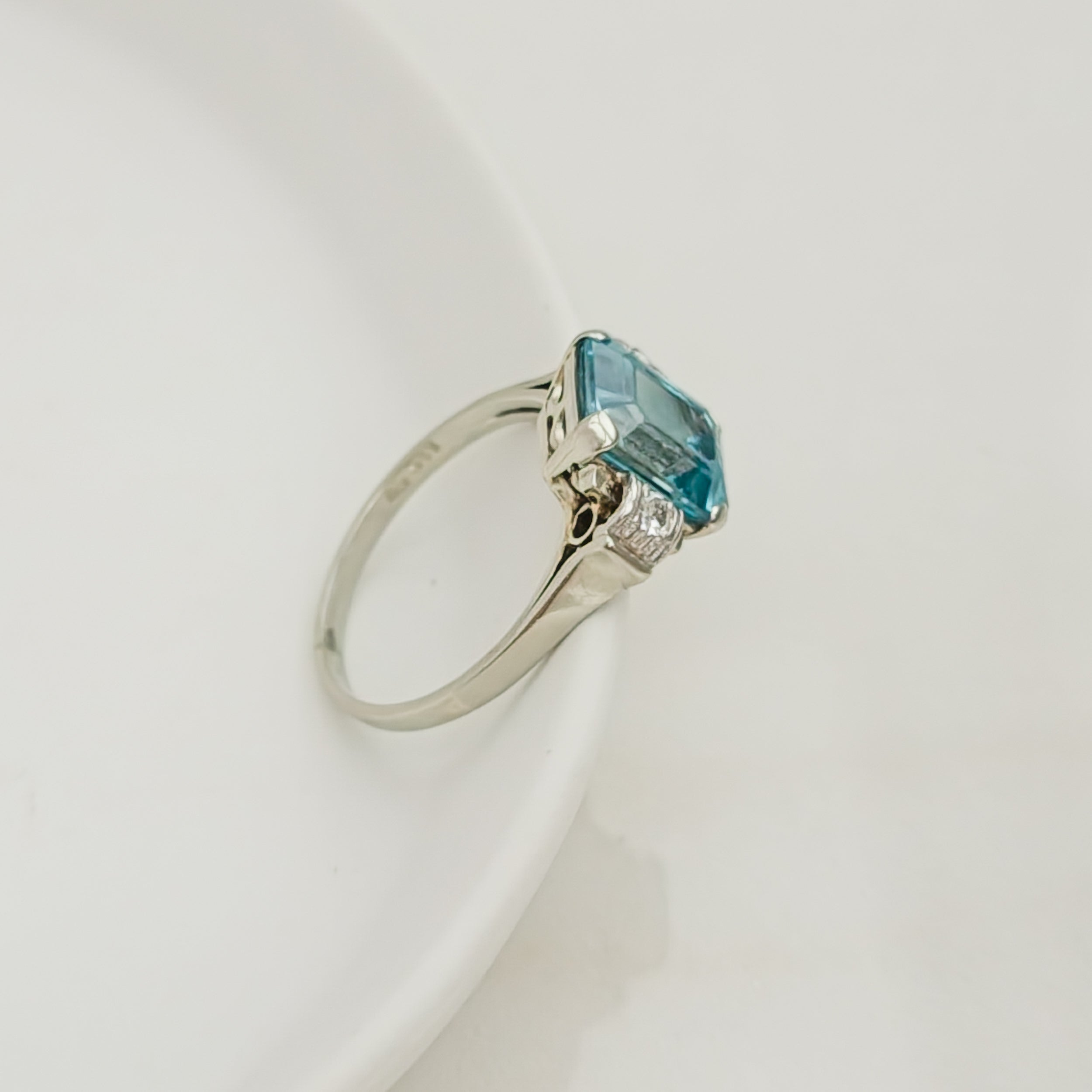 Vintage white gold ring with topaz and diamonds