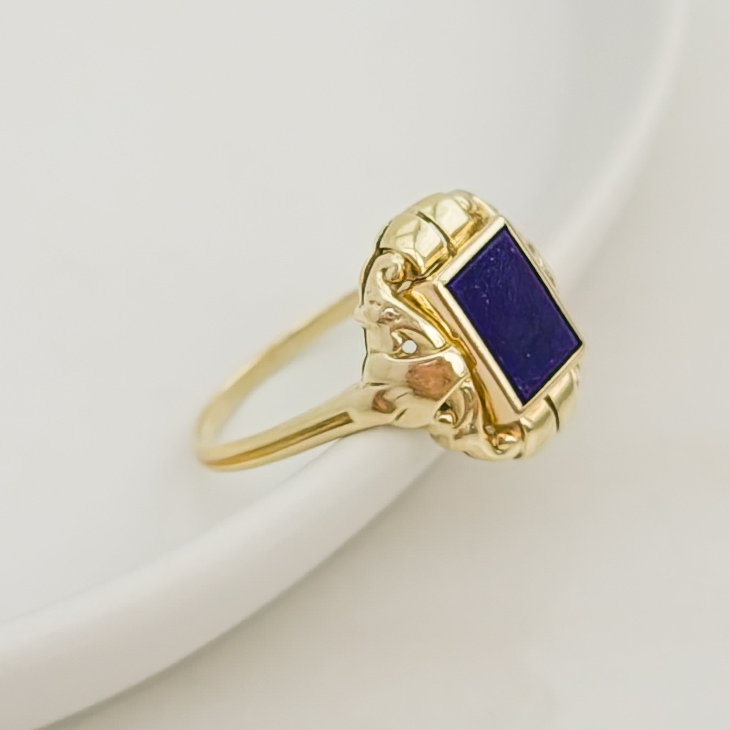 Antique gold ring with blue gemstone