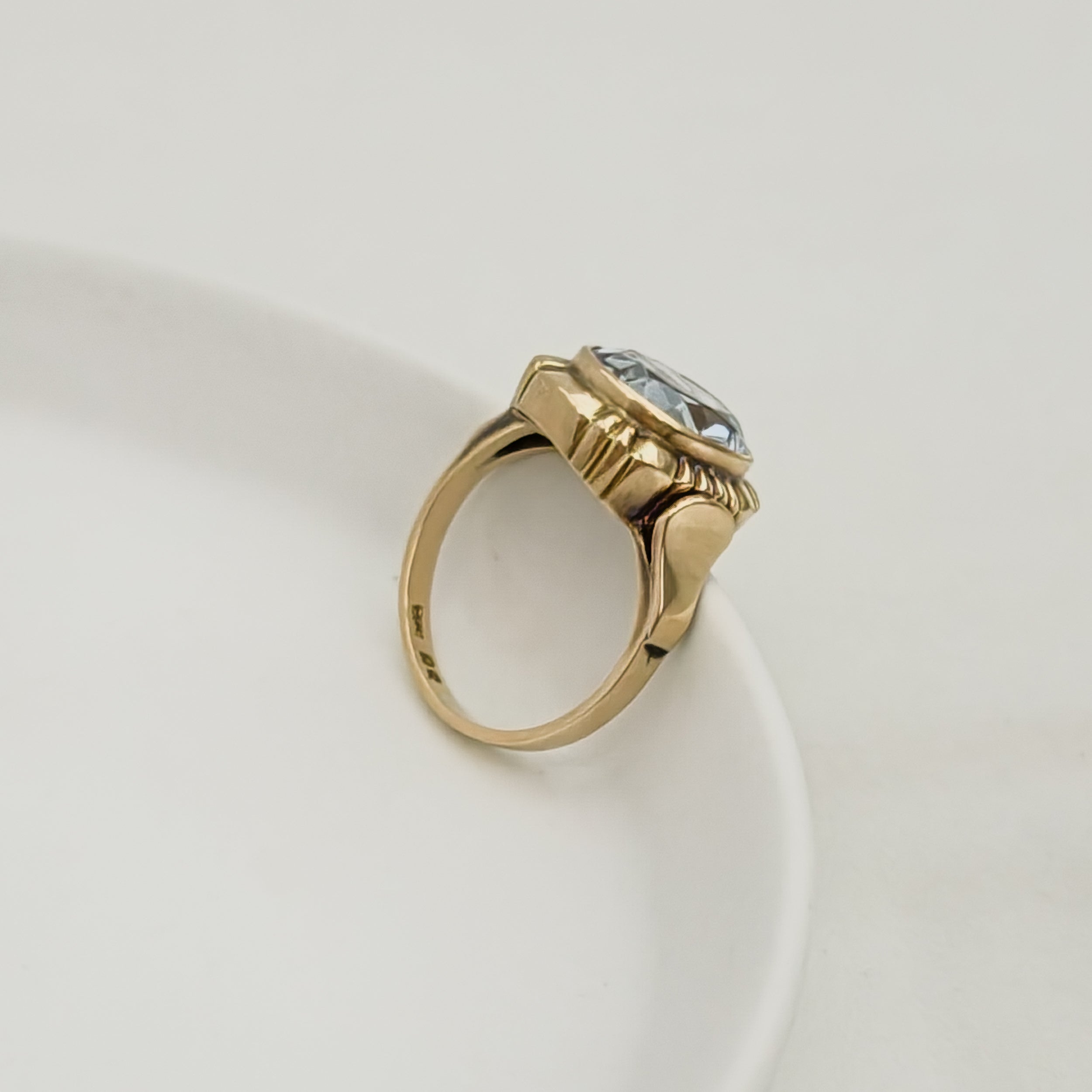 Antique gold ring with blue gemstone