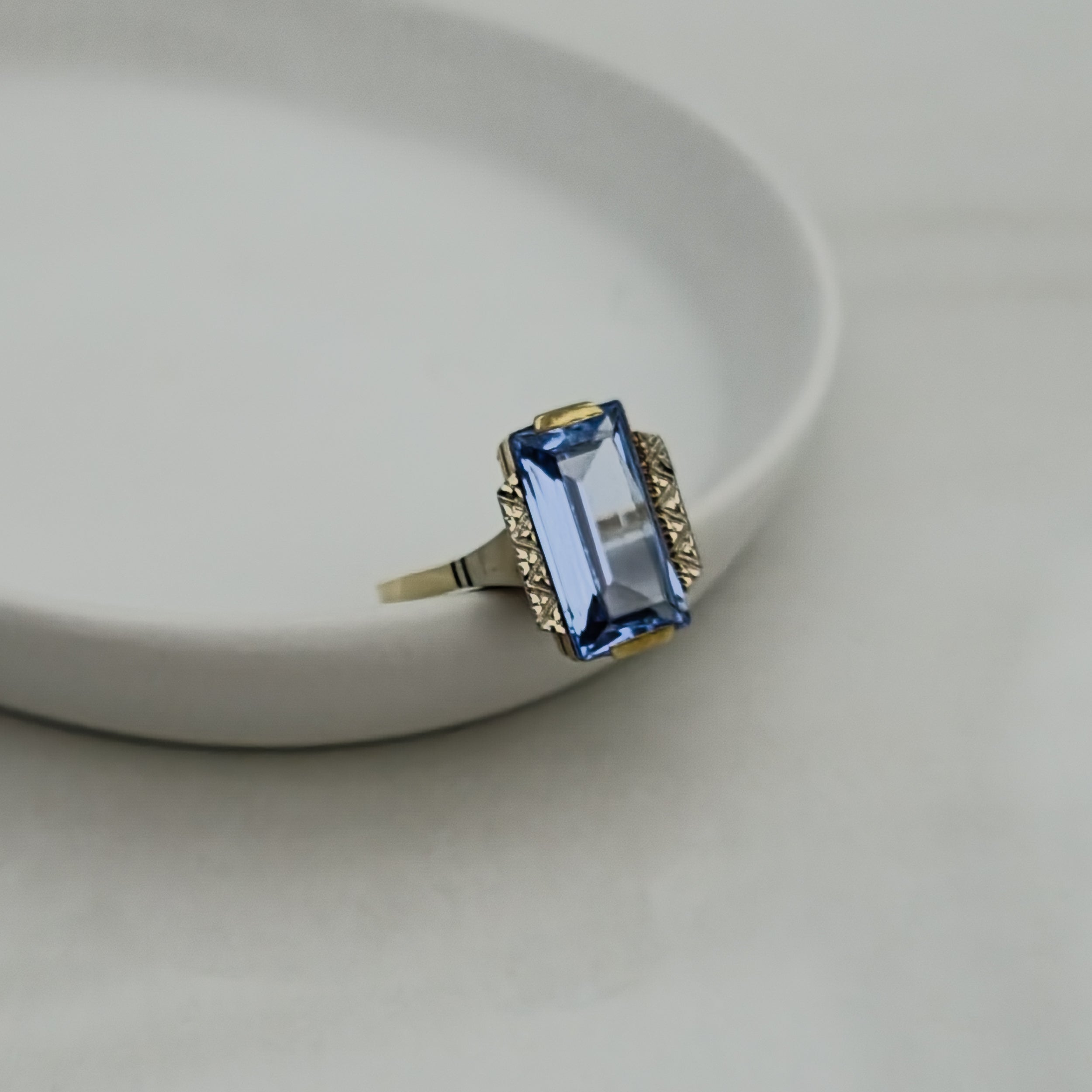 Antique gold ring with blue gemstone