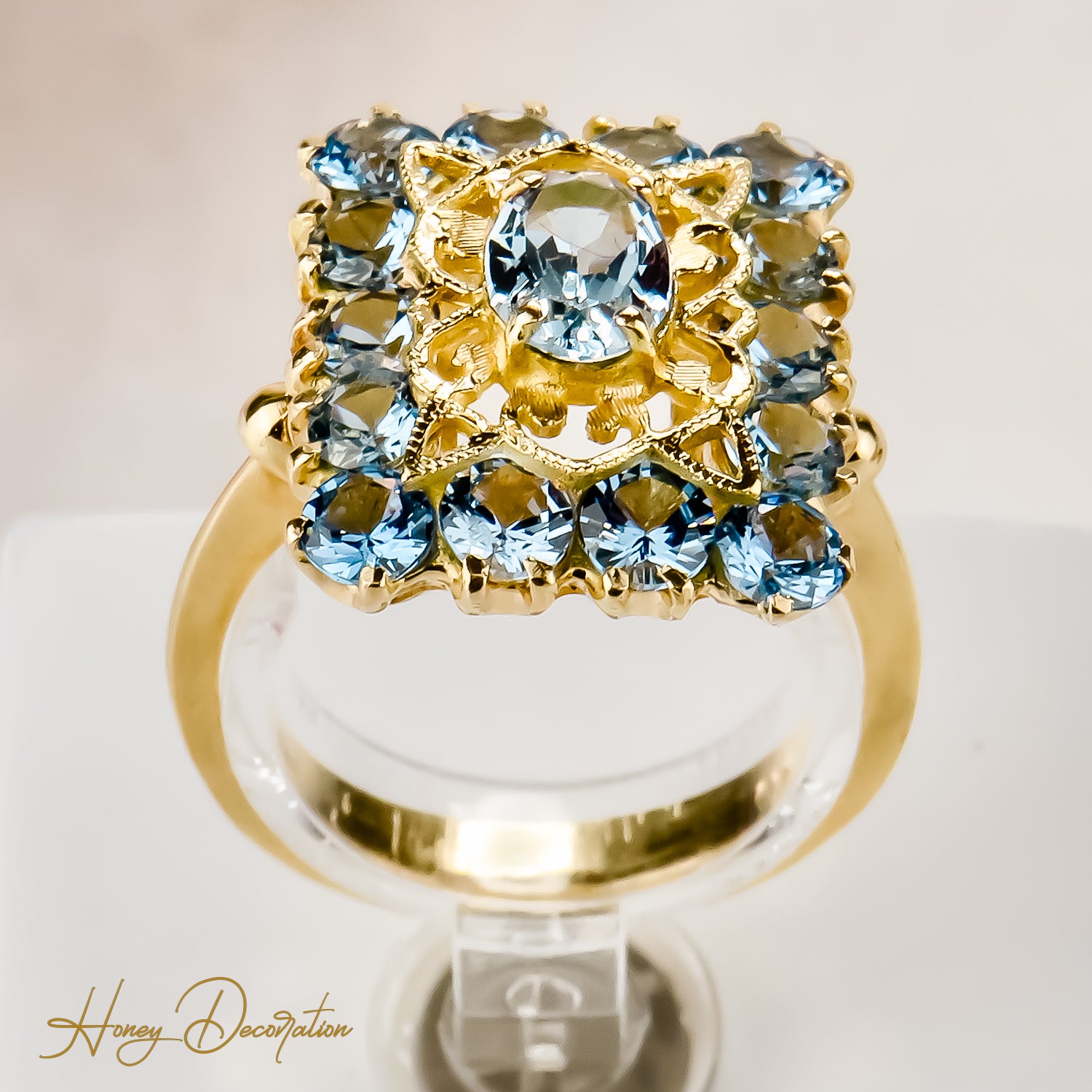 Vintage gold ring made of 18 carat yellow gold cast with blue gemstones