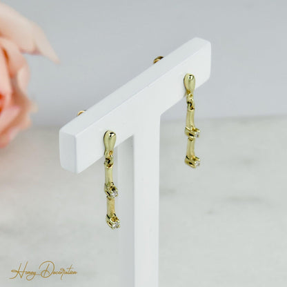 Elegante Goldohrringe mit Diamanten - Honey Decoration