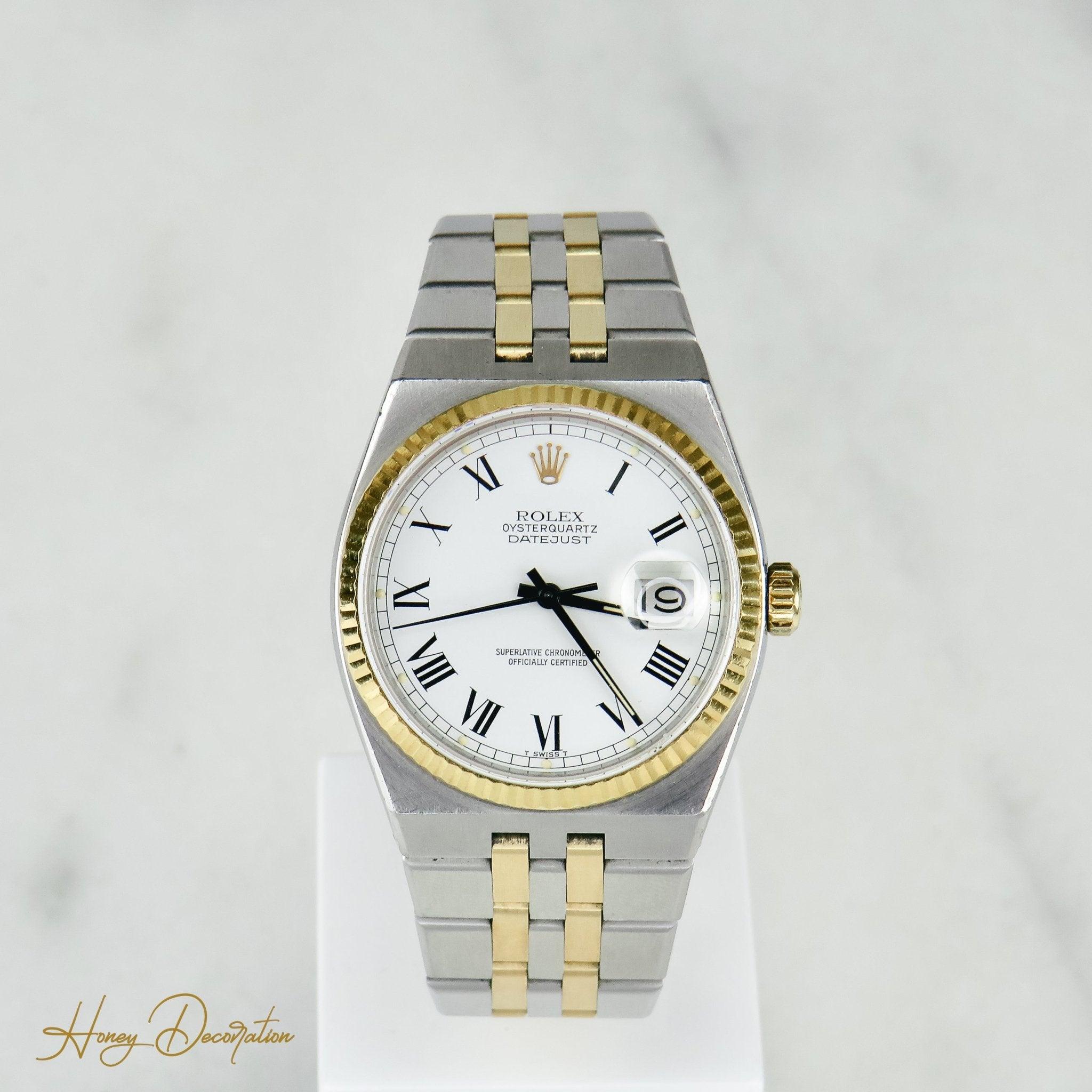 Rolex Date Just Quarz Stahl / Gold - Honey Decoration