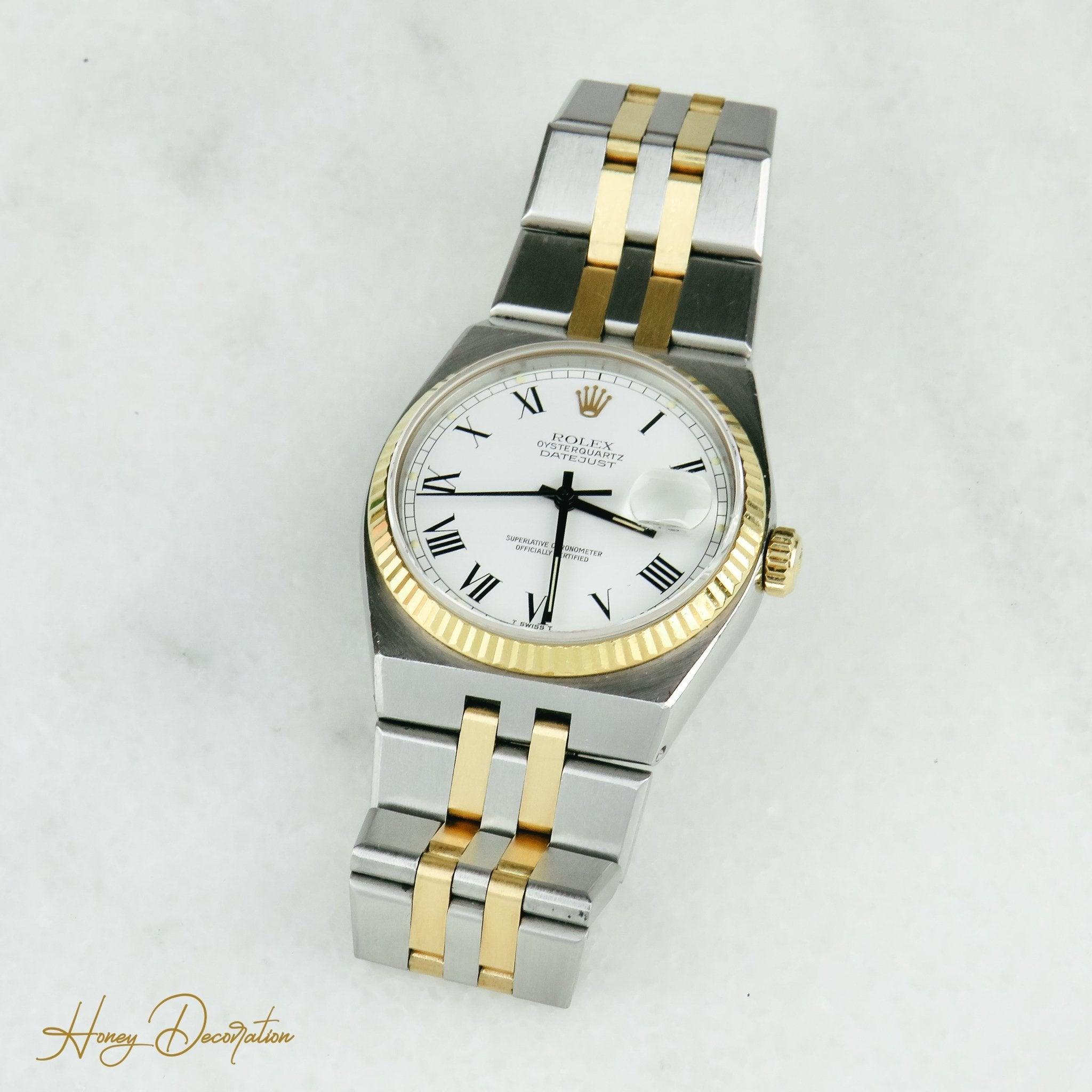 Rolex Date Just Quarz Stahl / Gold - Honey Decoration